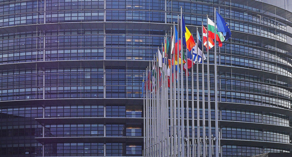 Flags outside the European Parliament building