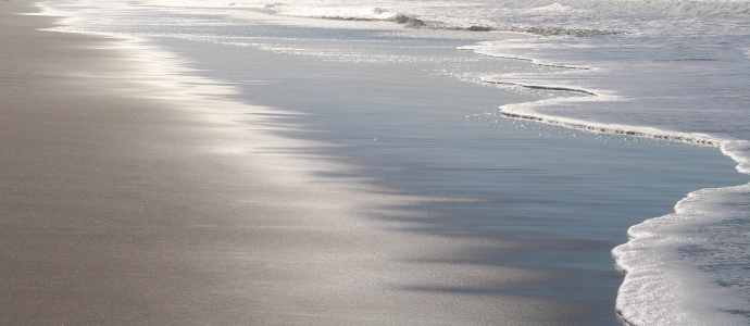 A sandy beach. Downloaded from https://pixabay.com/photos/nature-new-zealand-landscape-beach-1583744/ 28th November 2020.