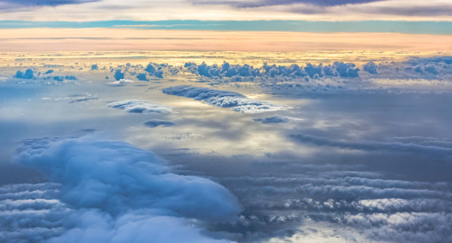 Showing earth from the sky with clouds