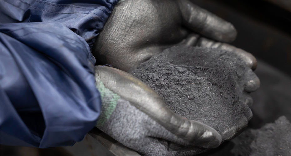 Hands holding battery powder