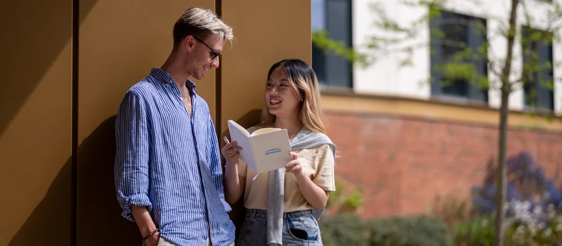 University of Exeter undergraduates making the most of student life on Streatham Campus.