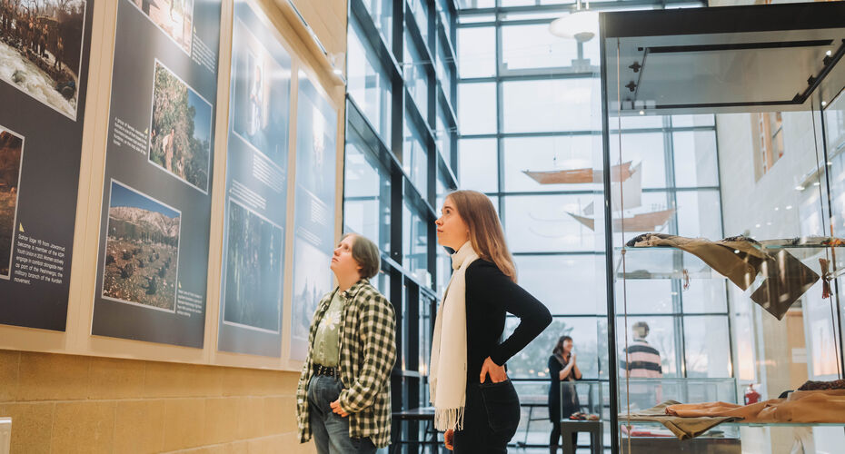 Students looking at an exhibition in the Institute of Arab and Islamic Studies