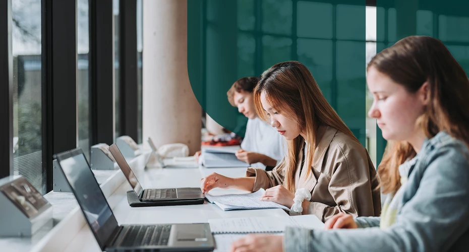 Students sat with laptops and working quietly