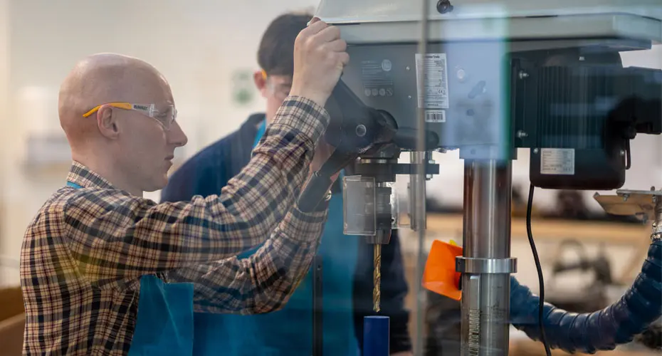 Student using machine