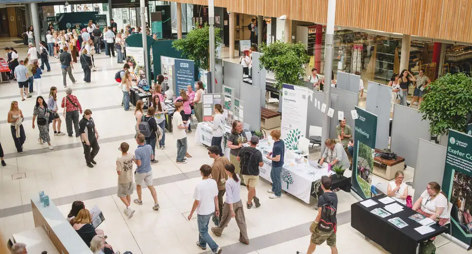 Open Day visitors walking through the interior of the Forum building