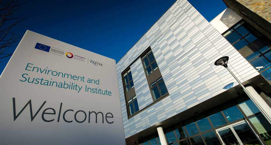 ESI building against a blue sky.