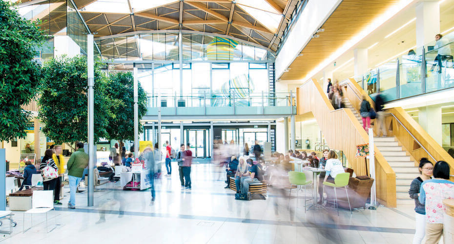 Students milling about in the Forum Street on Streatham Campus