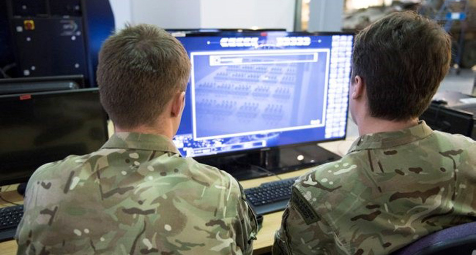 Soldiers looking at screen