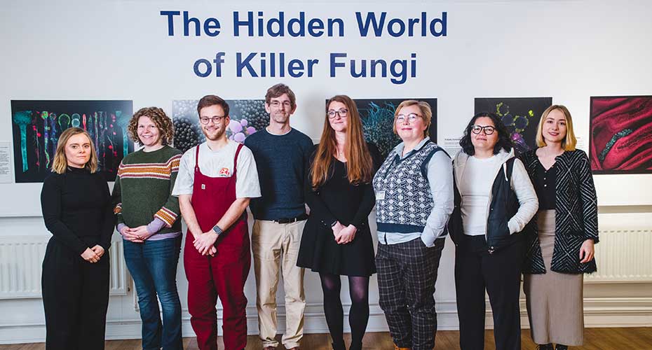People in front of the killer fungi exhibition
