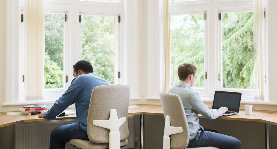Two students working in a window in Knightley