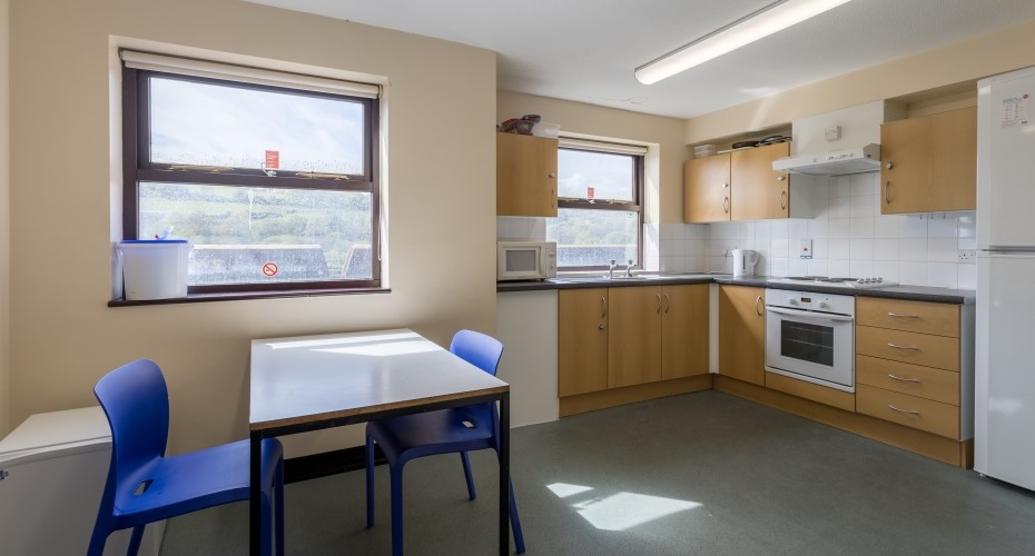 Open plan kitchen diner in Cook and Llewellyn Mews accommodation