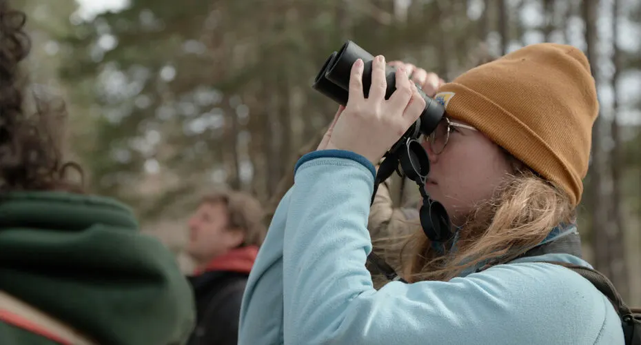 An Environmental Science student studying on a field trip in Scotland.