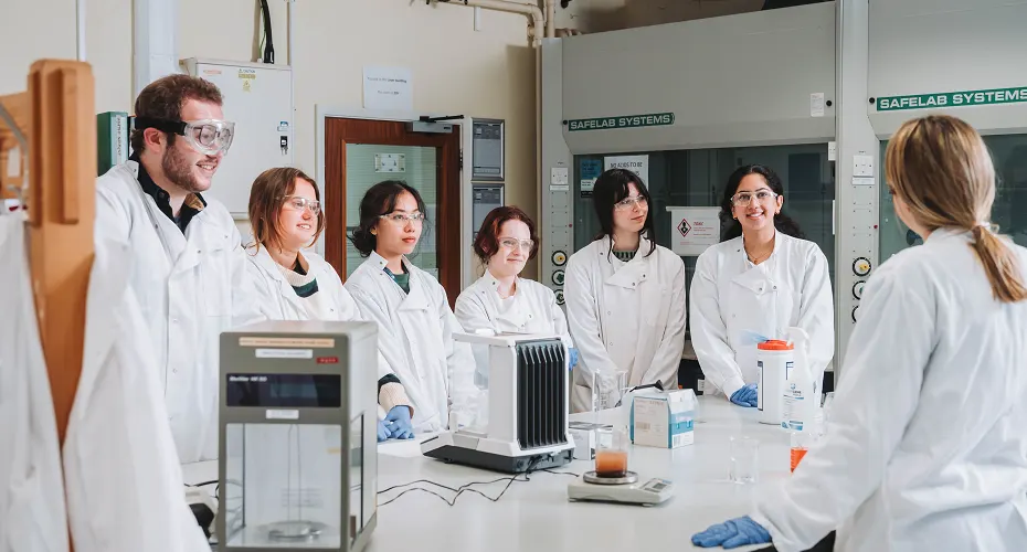 A group of Biomedical Sciences students taking part in a seminar activity in a lab.