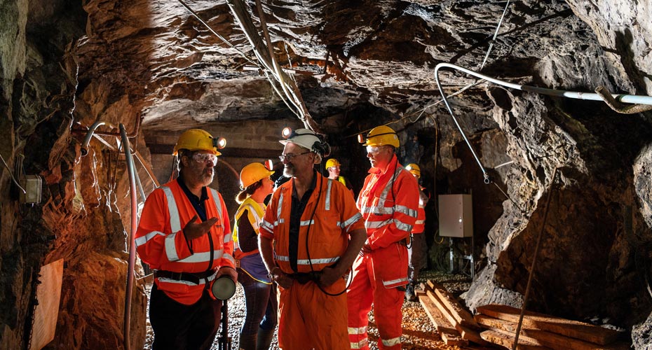 A group or researchers working in a mine