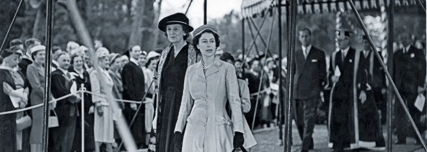 Her Majesty Queen Elizabeth II arrives to present the new University of Exeter with its Charter and unveil the foundation stone of the Queen’s Building in May 1956. With her is Mary, Dowager-Duchess of Devonshire, Chancellor from 1955 to 1971.