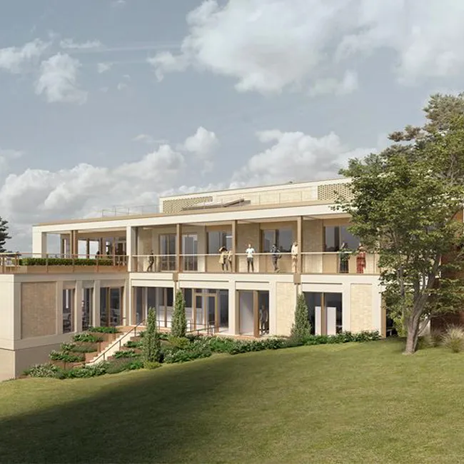 A mock up of the Al Qasimi Building - a light coloured building with lots of windows set into a hill.