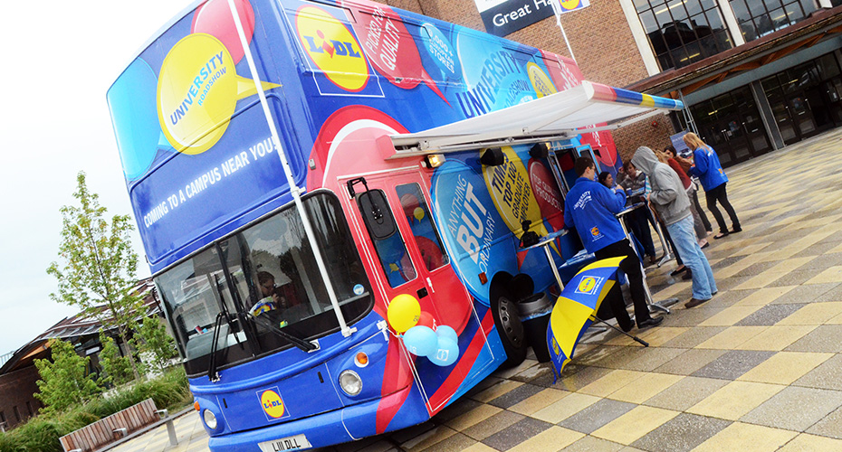 A Lidl branded bus parked on the Piazza for a showcase event