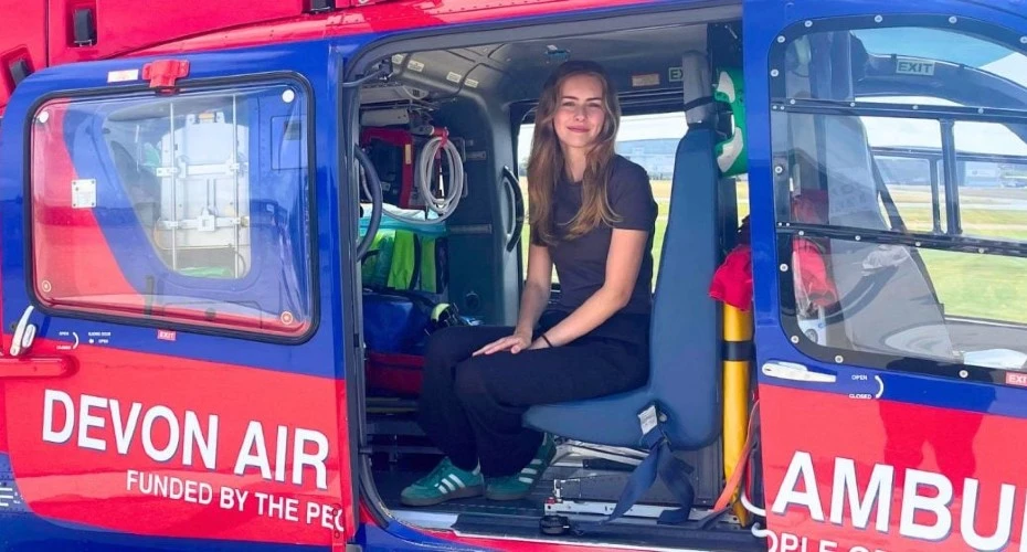 Ellie sitting in an Air Ambulance