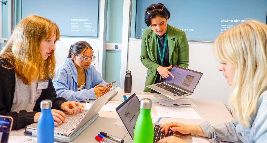 Students collaborating with employers