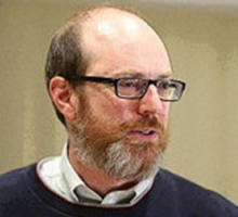 Photo of Brandon Gallaher - he is in a room