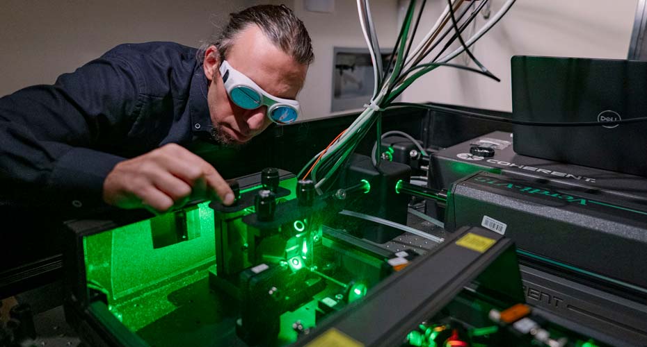 A researcher in a Physics lab