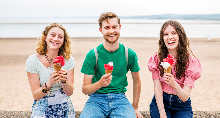 Three students eating ice cream