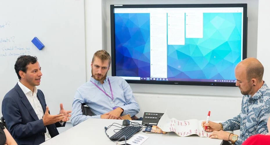 Colleagues collaborating around a table