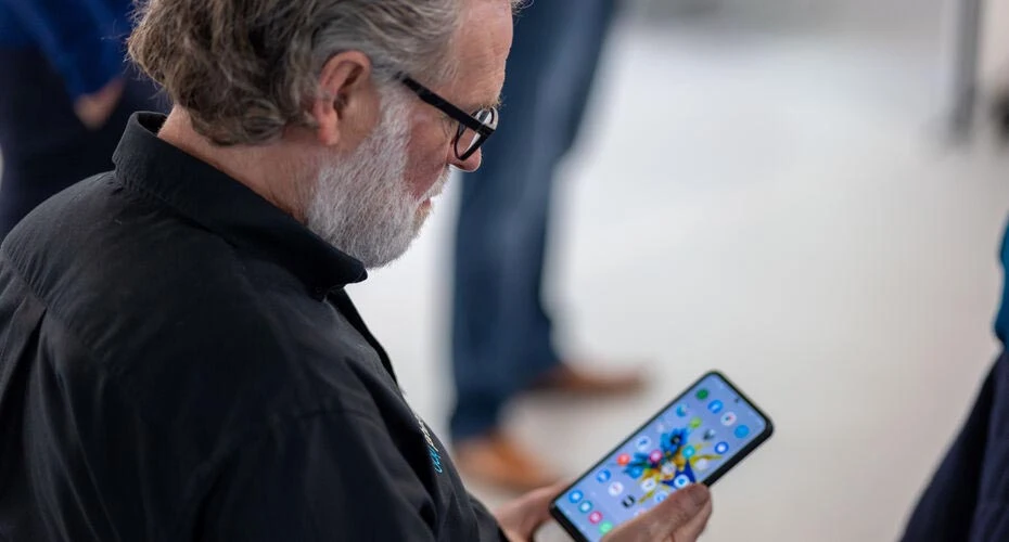 Staff member using a mobile phone